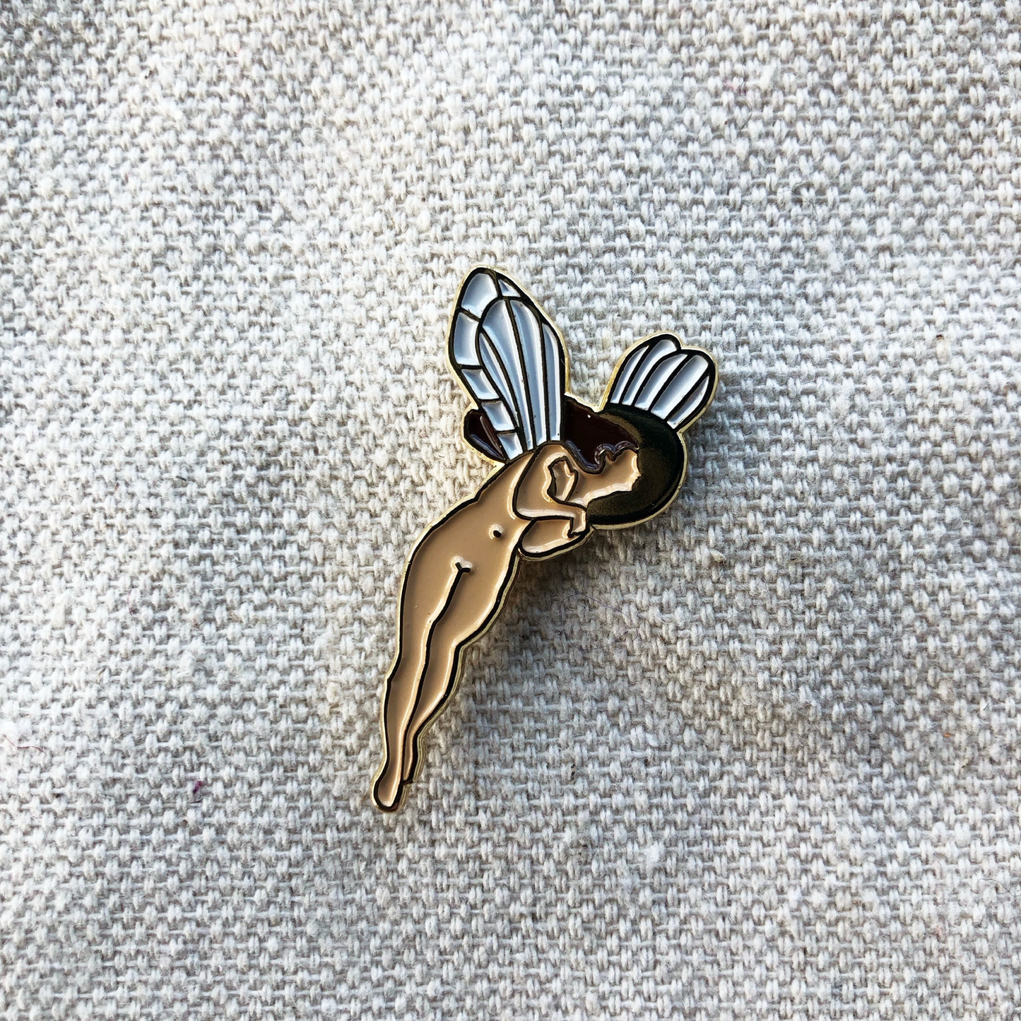 Enamel pin badge of Iris by John Atkinson Grimshaw on a canvas background