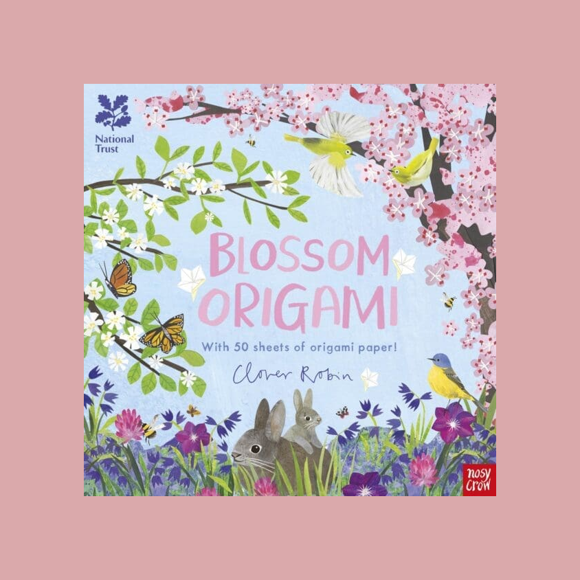 The front cover of the children's origami book 'Blossom Origami!' by Clover Robin, published by Nosy Crow. The cover features a colorful, whimsical spring illustration with cherry blossoms, a green bird, a yellow bird, butterflies, rabbits, and wildflowers on a light blue background.