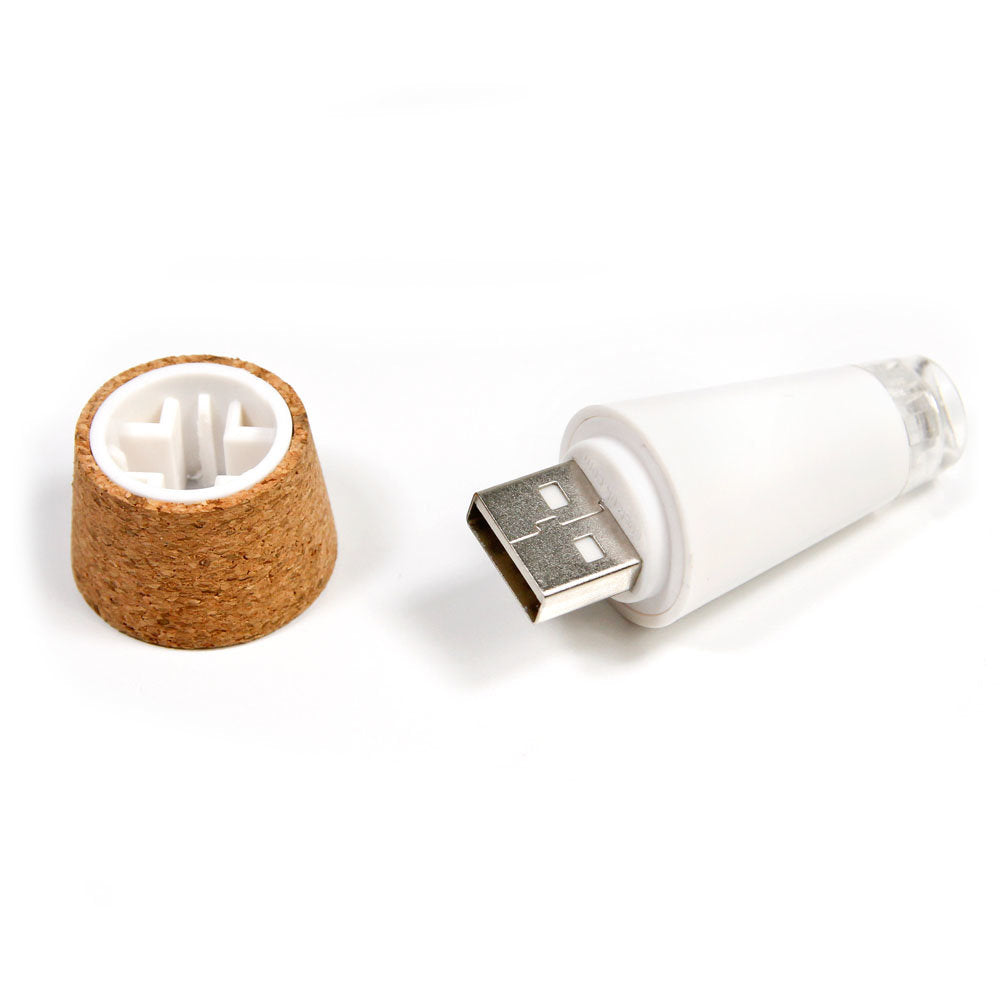 The Bottlelight separated into its component parts showing its USB charger.