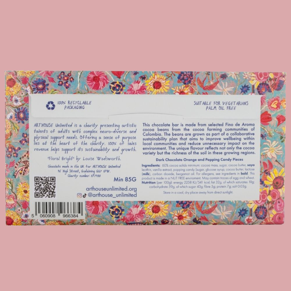The back of a chocolate bar package by Arthouse Unlimited, featuring a colorful floral border and a white central label with product details, ingredients, and a barcode.