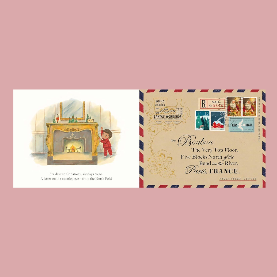 A children's Christmas-themed postcard book spread shown against a solid pink background. On the left is a square postcard featuring a watercolor illustration of a child in a red coat standing in front of a decorated fireplace, with text below.