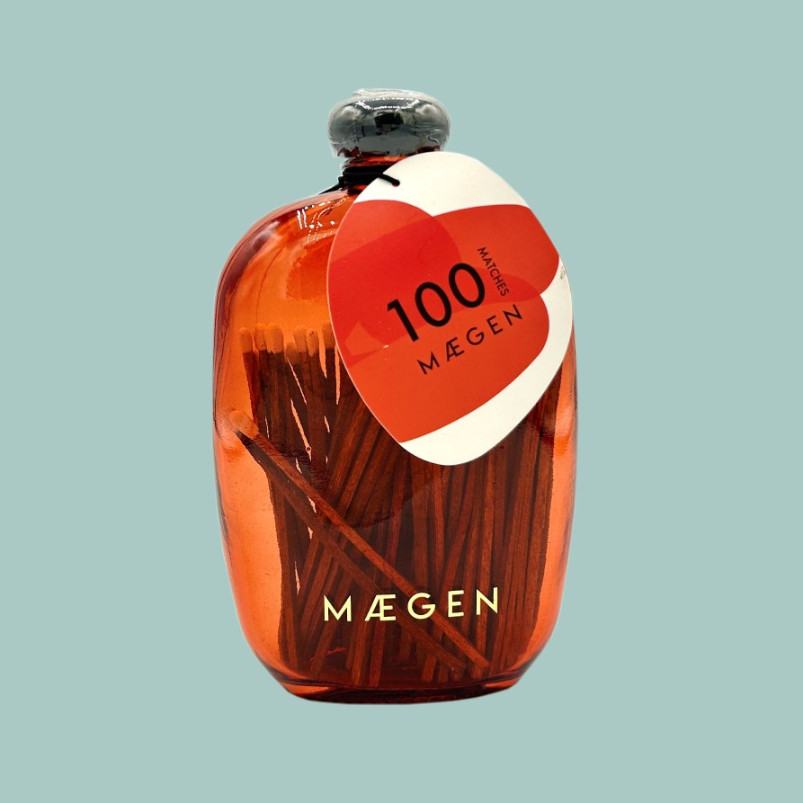 100 matches in a red glass rectangle bottle with rounded edges.