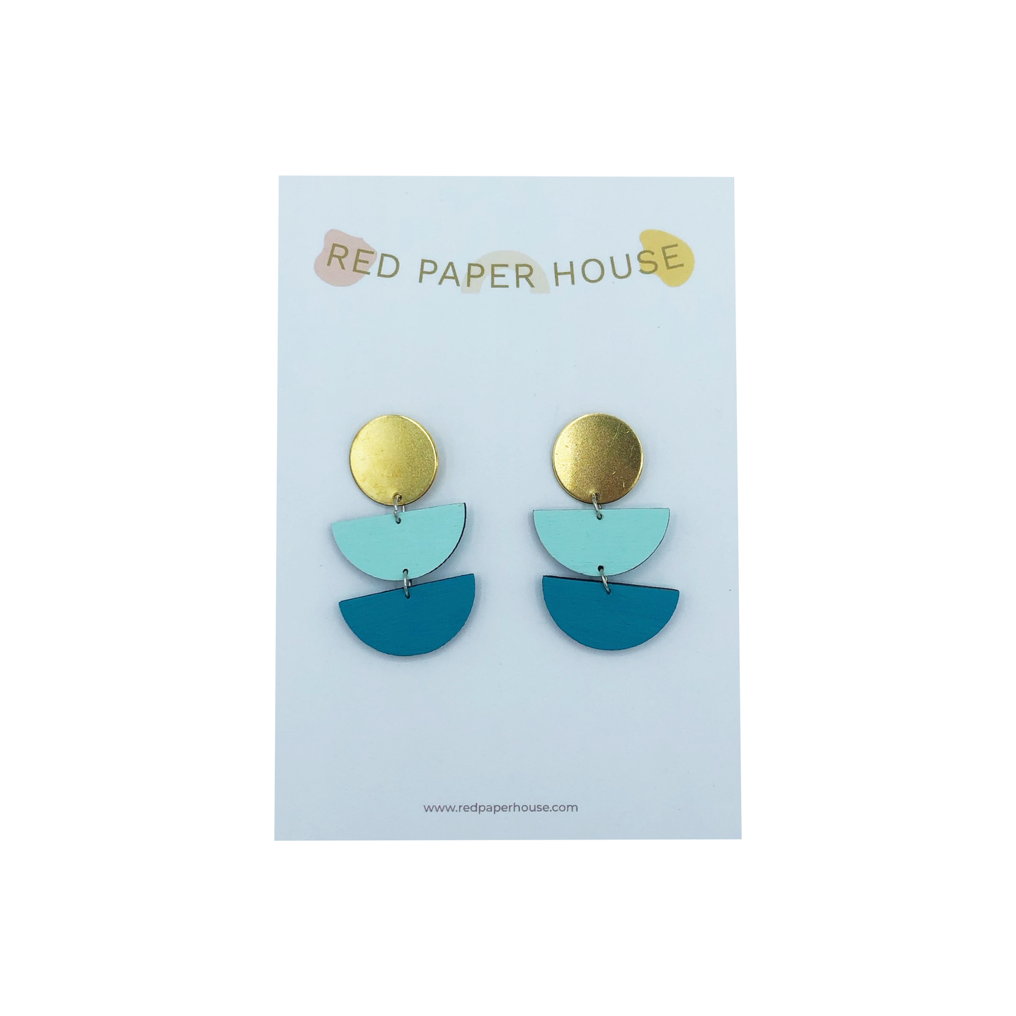 Pair of earrings on a Red Paper House branded card