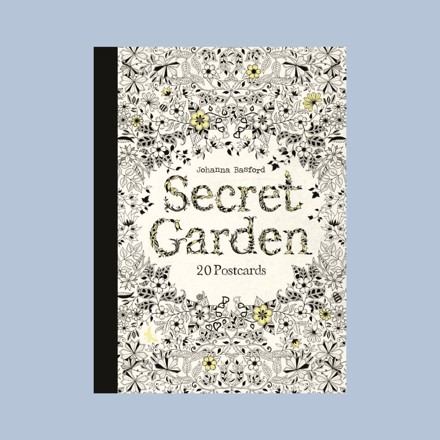 Postcard book titled 'Secret Garden' with floral design on a light blue background