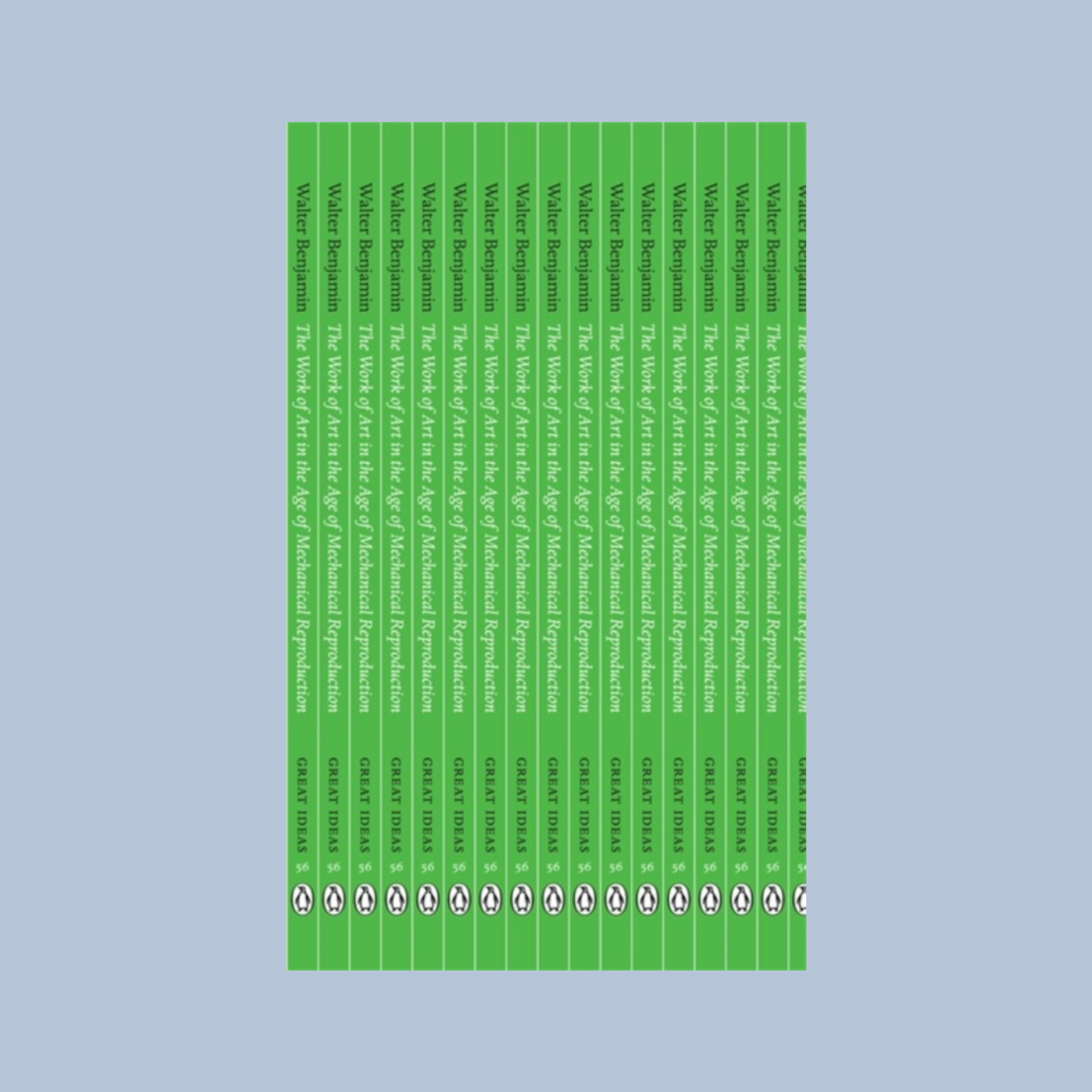 Front cover of 'The Work of Art in the Age of Mechanical Reproduction' which has an illustration of repeated book spines which are green on a with white text. The book is on a light blue background.