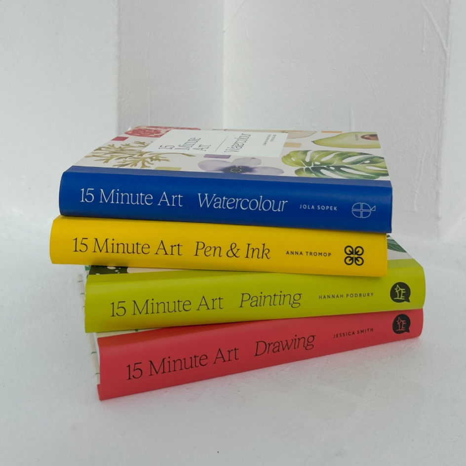 A stack of 15 Minute Art Books in Blue, Yellow, Green, and Red.