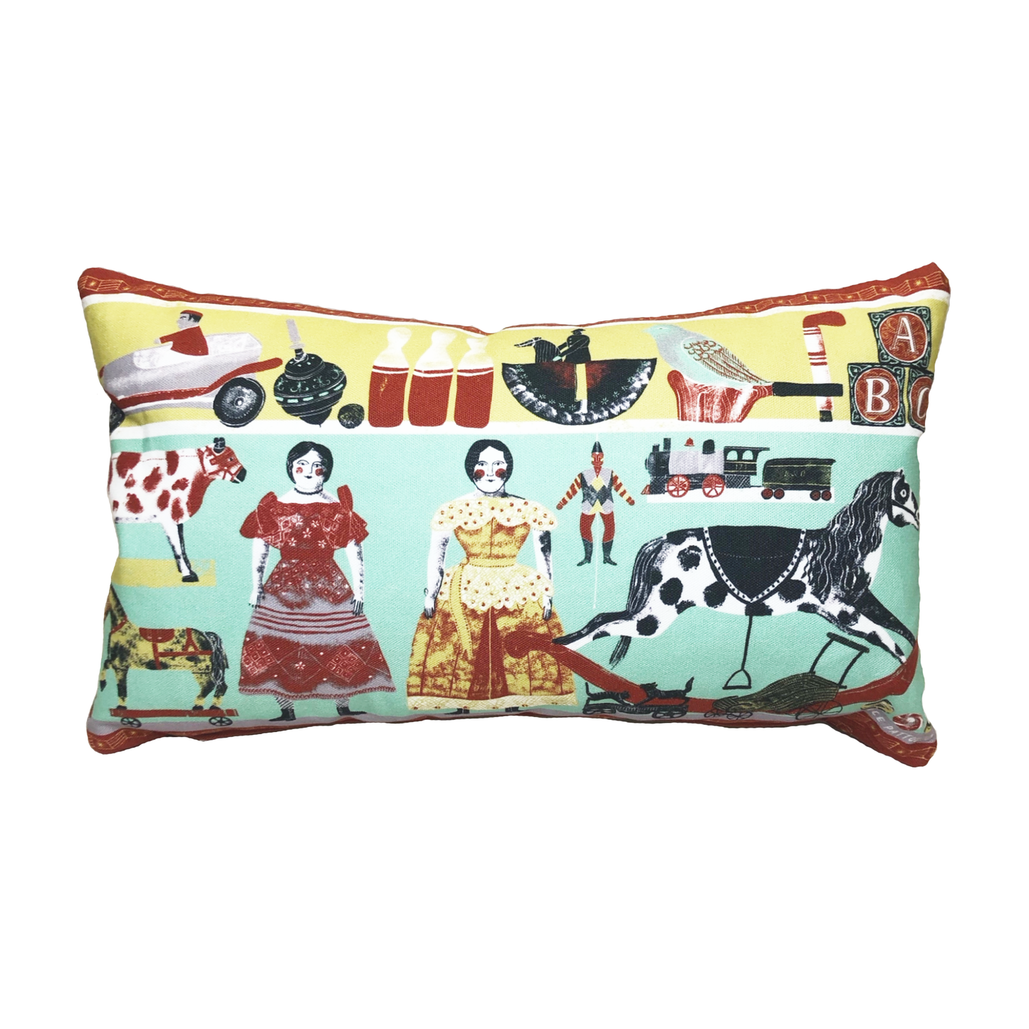 An Abbey House Museum rectangular cushion displaying Victorian illustrations of toys 