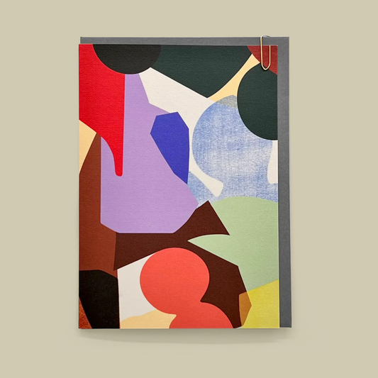 Abstract art with colorful geometric shapes greetings card with grey enevelope on a beige background