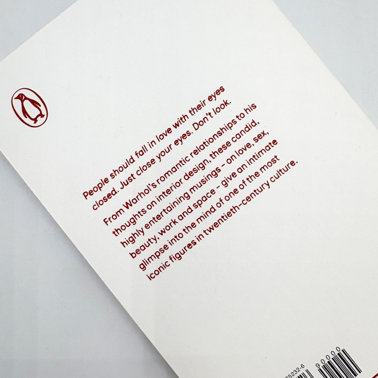 Book cover with text and Penguin logo on a light gray background