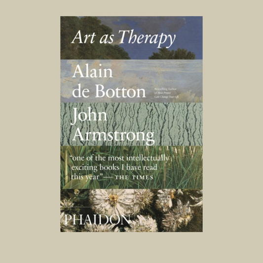 Book cover of 'Art as Therapy' by Alain de Botton and John Armstrong with a scenic background.
