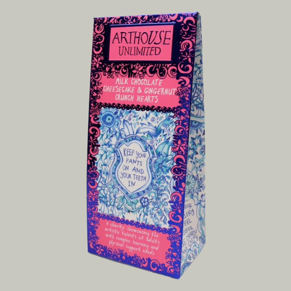 Blue and white patterned carton packaging with pink borders and the text 'ARTHOUSE UNLIMITED' and 'KEEP YOUR PANTS ON AND YOUR TEETH IN.' 