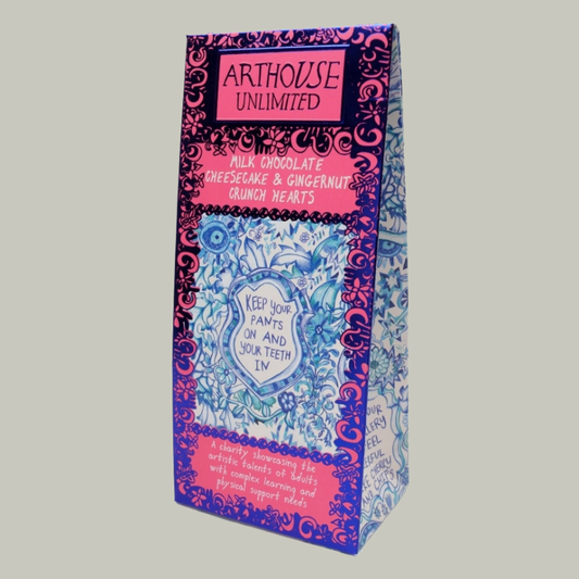 Blue and white patterned carton packaging with pink borders and the text 'ARTHOUSE UNLIMITED' and 'KEEP YOUR PANTS ON AND YOUR TEETH IN.' 