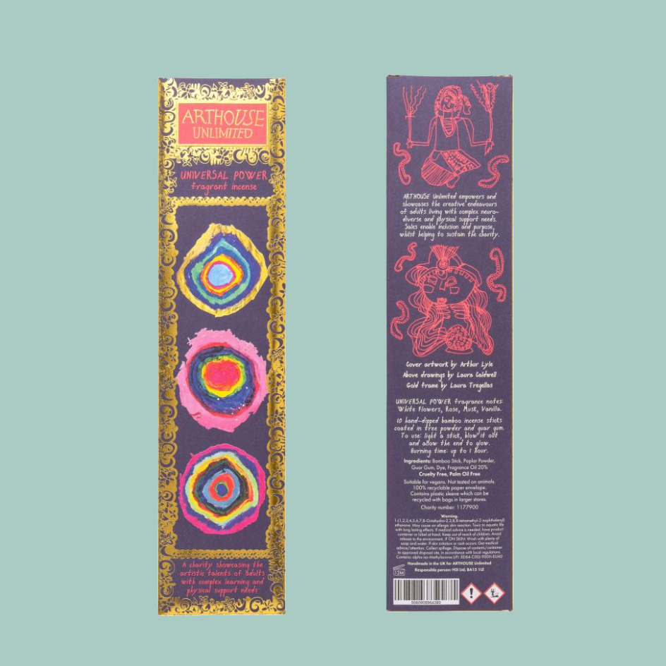 Two vertical product packaging panels for Arthouse Unlimited 'Universal Power' incense sticks on a solid light teal background. The left panel shows the front with gold ornate borders and three colorful concentric designs.