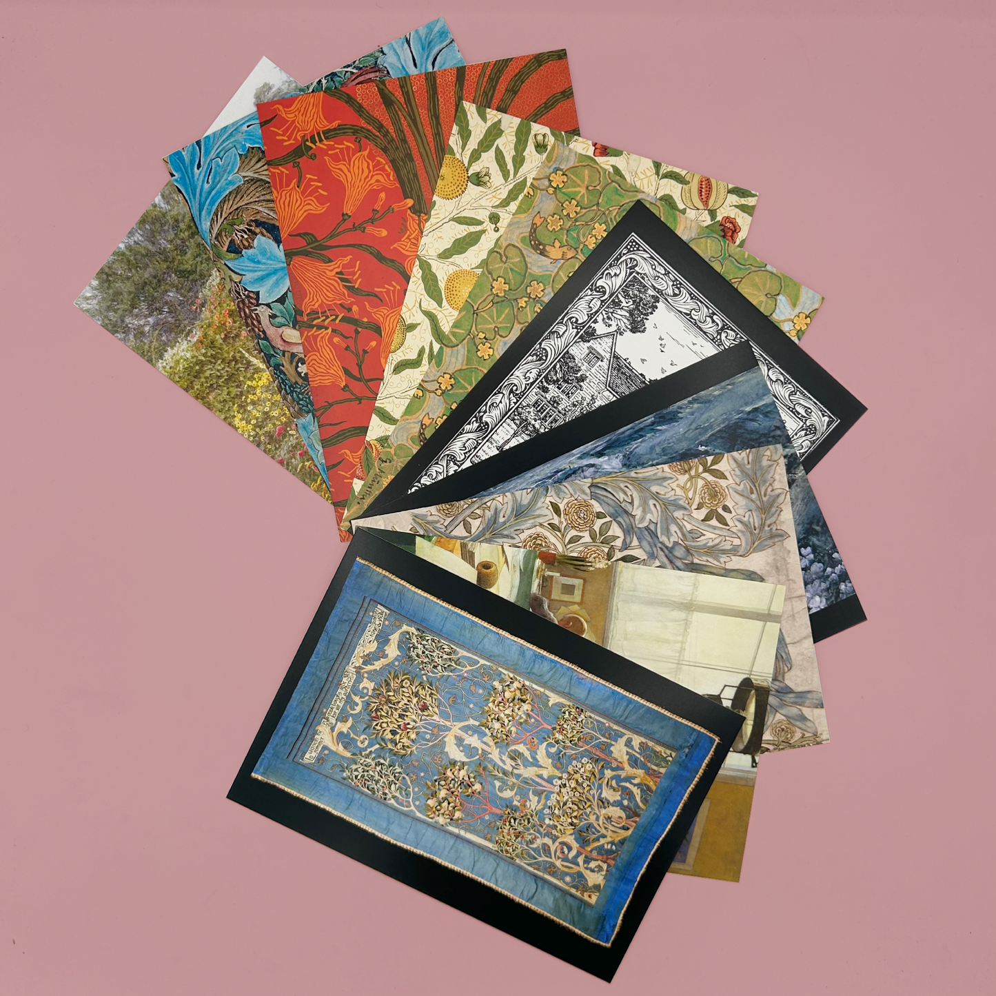 Collection of decorative postcards with various patterns on a pink background
