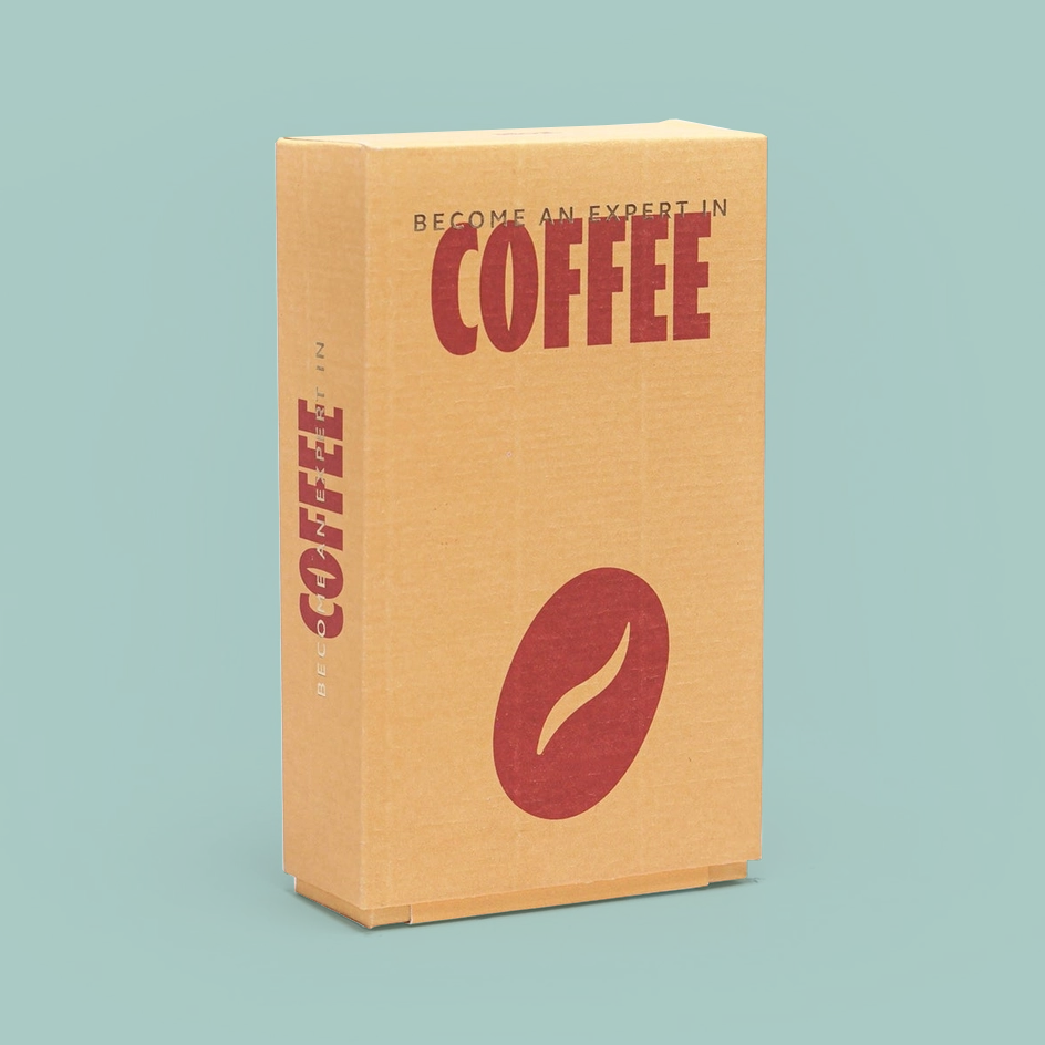 A tall rectangular cardboard box with a kraft-paper tan finish, featuring the word 'COFFEE' in large dark red letters on the front and a matching red coffee bean graphic. The side also shows the word 'COFFEE' vertically.
