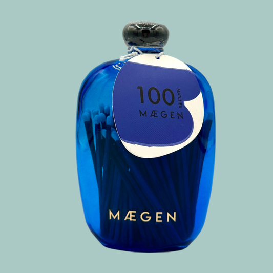100 matches in a blue glass rectangle bottle with rounded edges. 