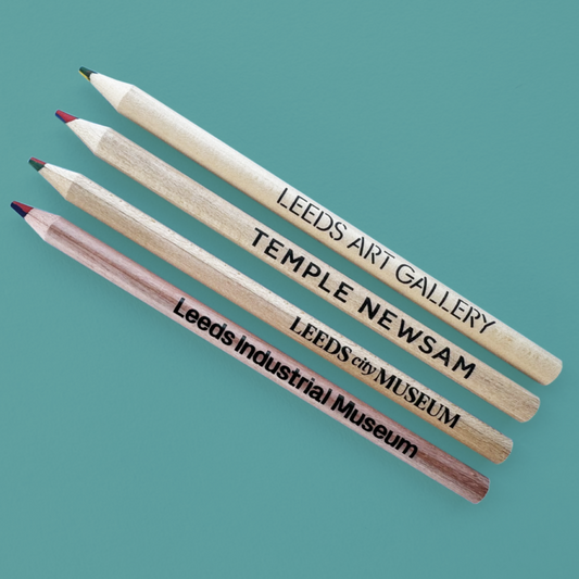 Four pencils with coloured leads and branding in black text.