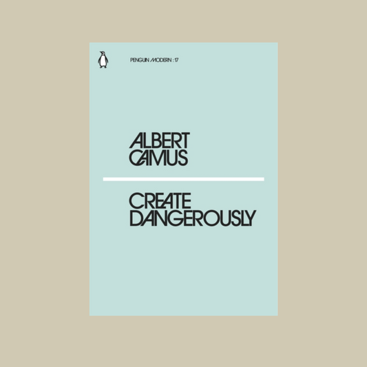 Front cover of 'Create Dangerously' on a gold background.