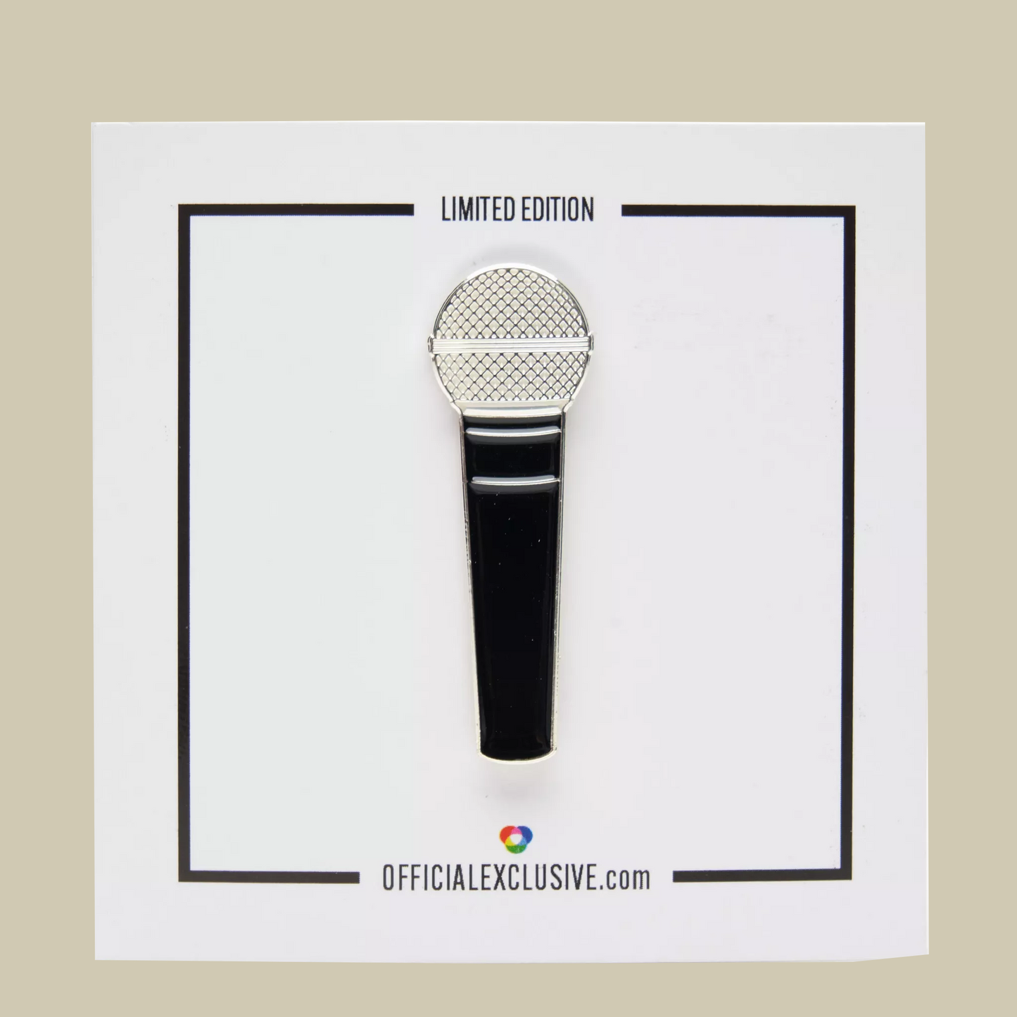 Microphone-shaped pin on a white card with 'Limited Edition' text