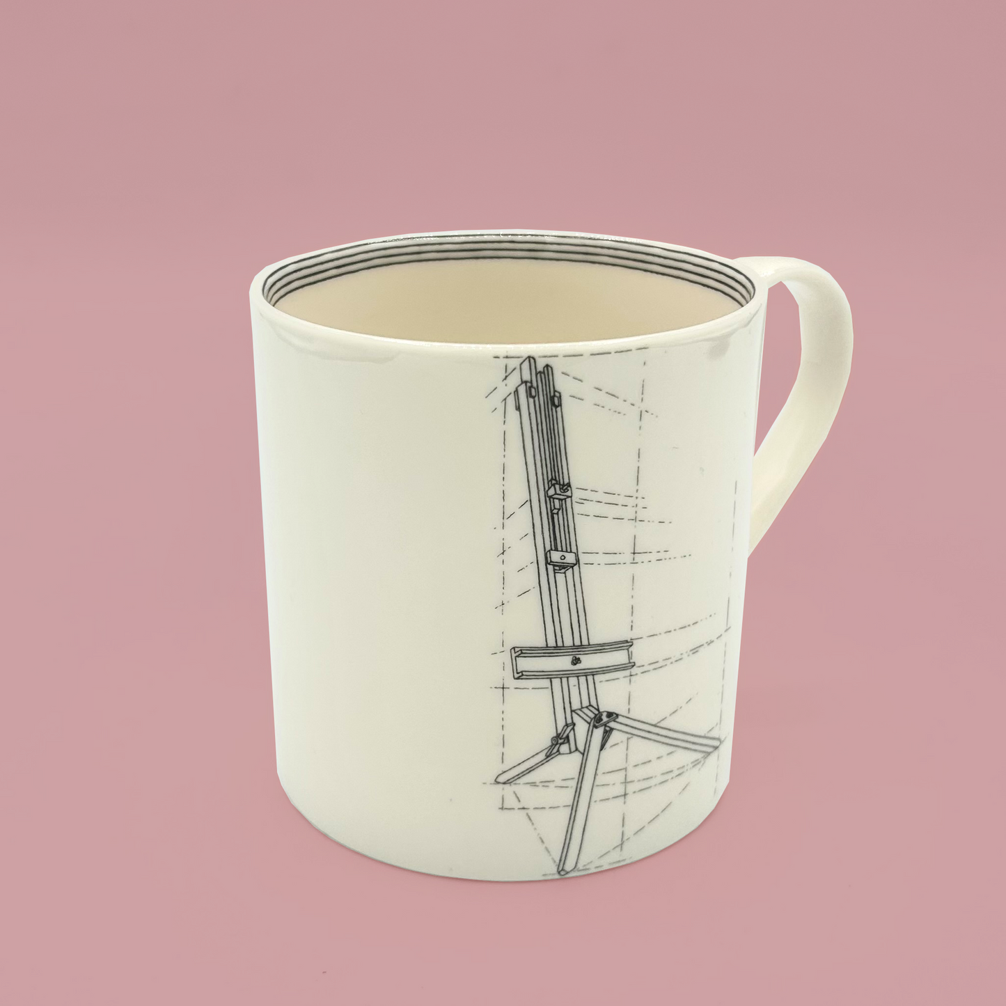 White mug with easel design on a pink background