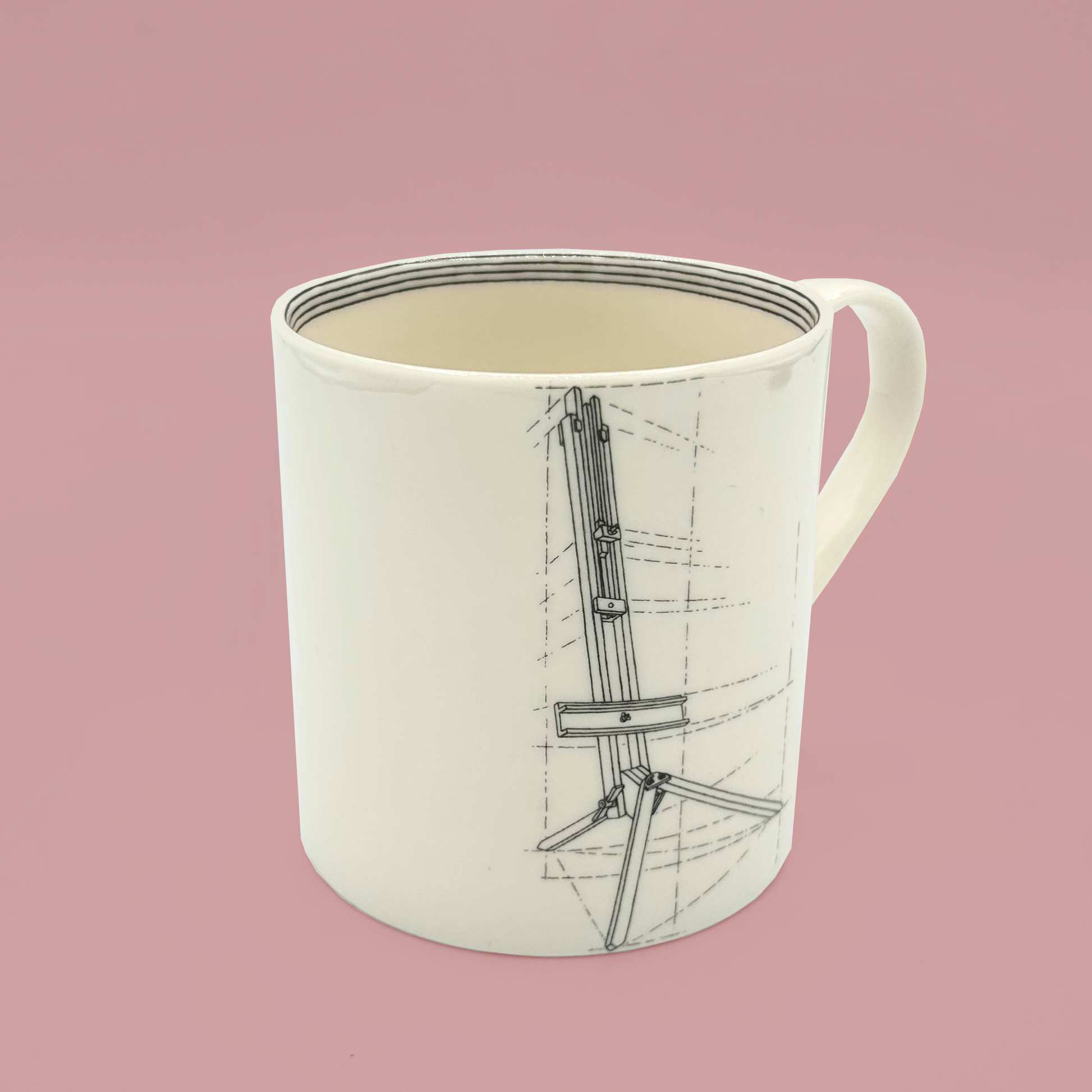 White mug with easel design on a pink background