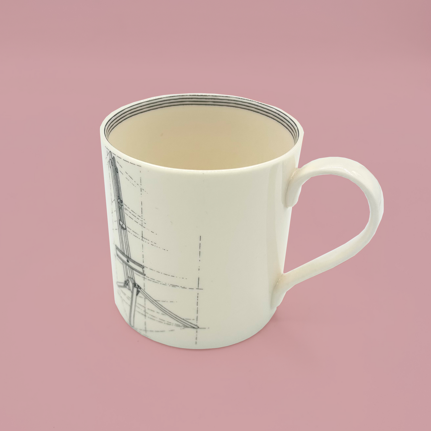 White mug with easel design on a pink background