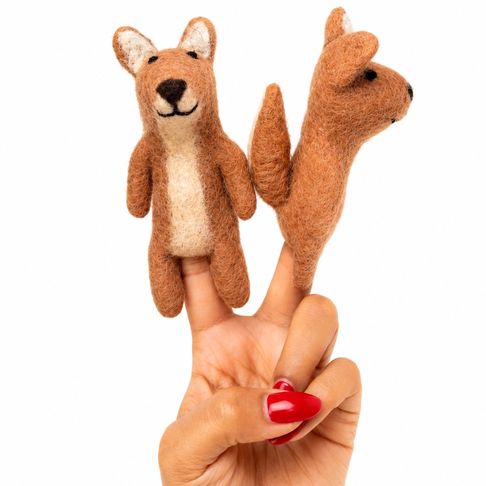 Two felt fox finger puppets held on a person's fingers against a plain white background. One fox faces forward with a cream belly, and the other faces sideways with a brown tail.