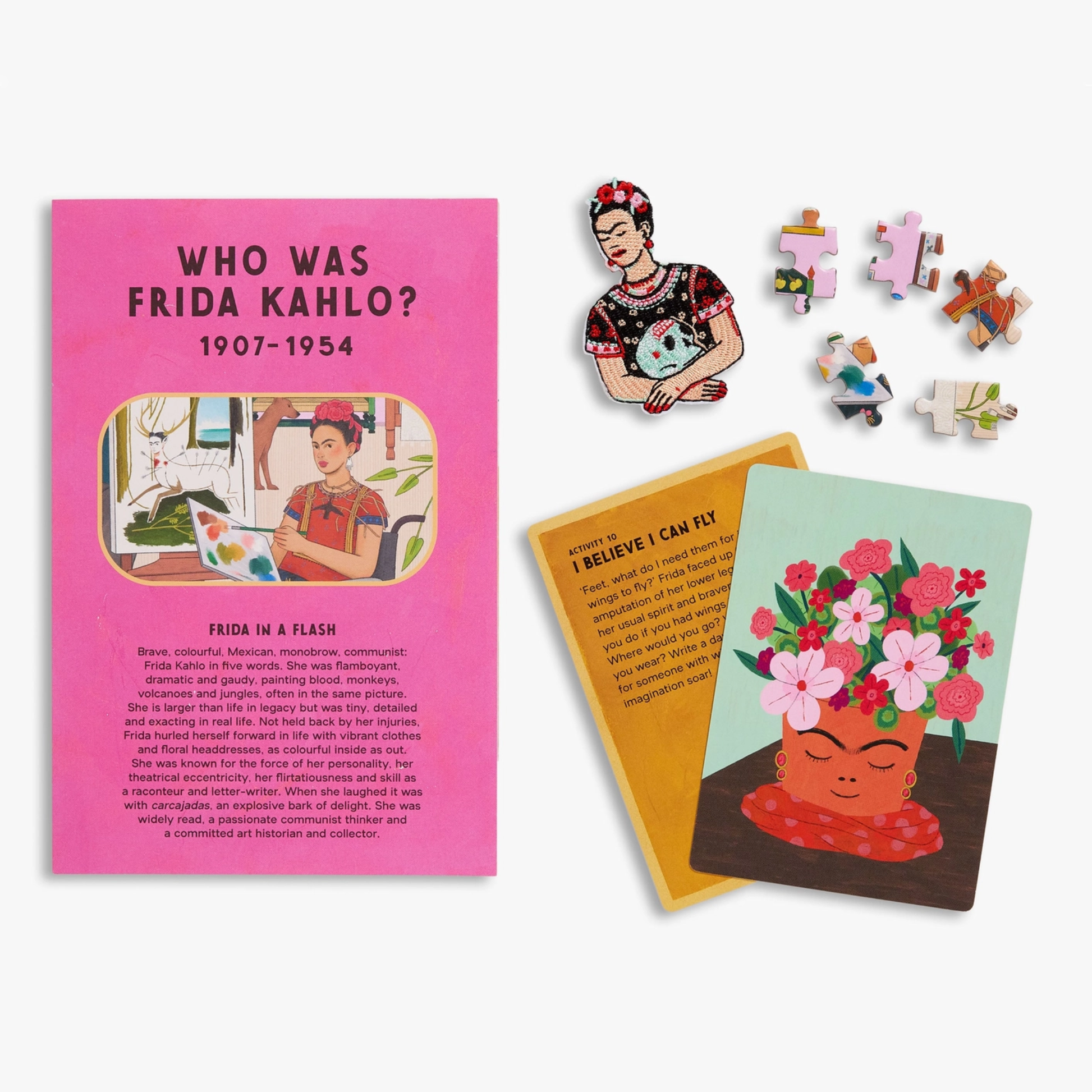 Frida Kahlo-themed educational set with book, cards, and puzzles on a white background