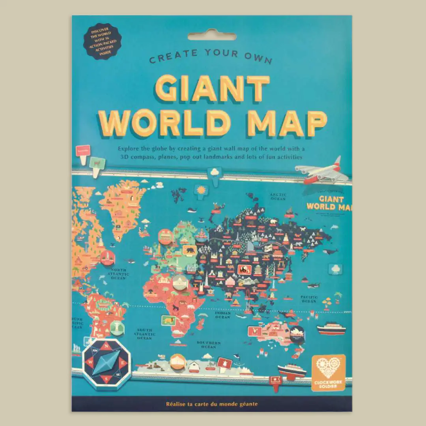 A children's craft kit package titled 'Giant World Map' with a bright blue illustrated world map cover, shown against a plain beige background.
