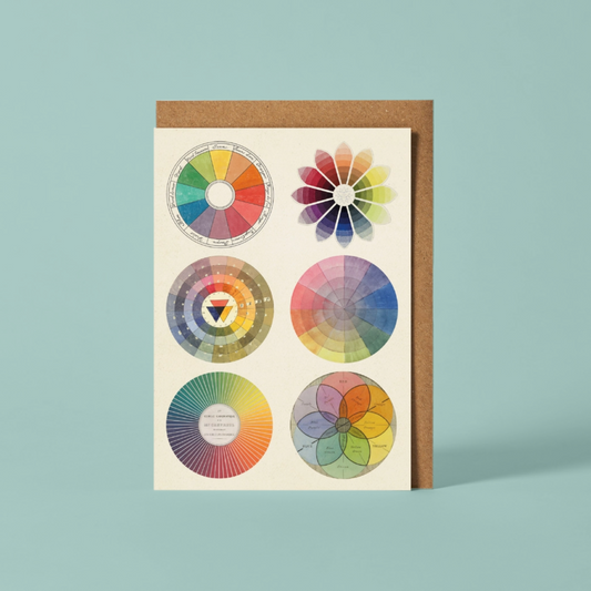 Greeting card with color wheel design on a light blue background