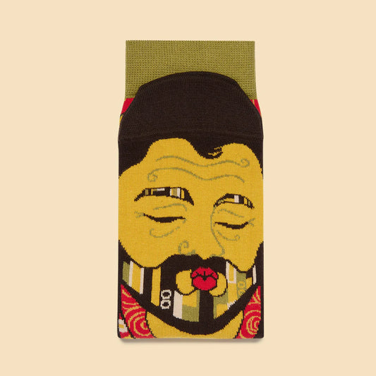 Sock with a graphic design of a face on a beige background