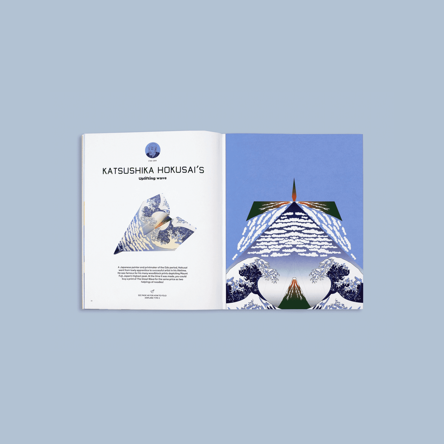 Open book with Katsushika Hokusai's artwork on a light blue background