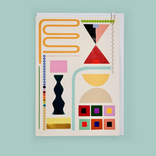 Colorful geometric design greeting card on a light blue background