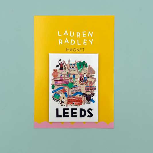 Yellow and pink packaging which reads 'Lauren Radley Magnet.' The magnet itself is white with a ditigtally designed map illustration of Leeds and 'LEEDS' in black handwritten font.