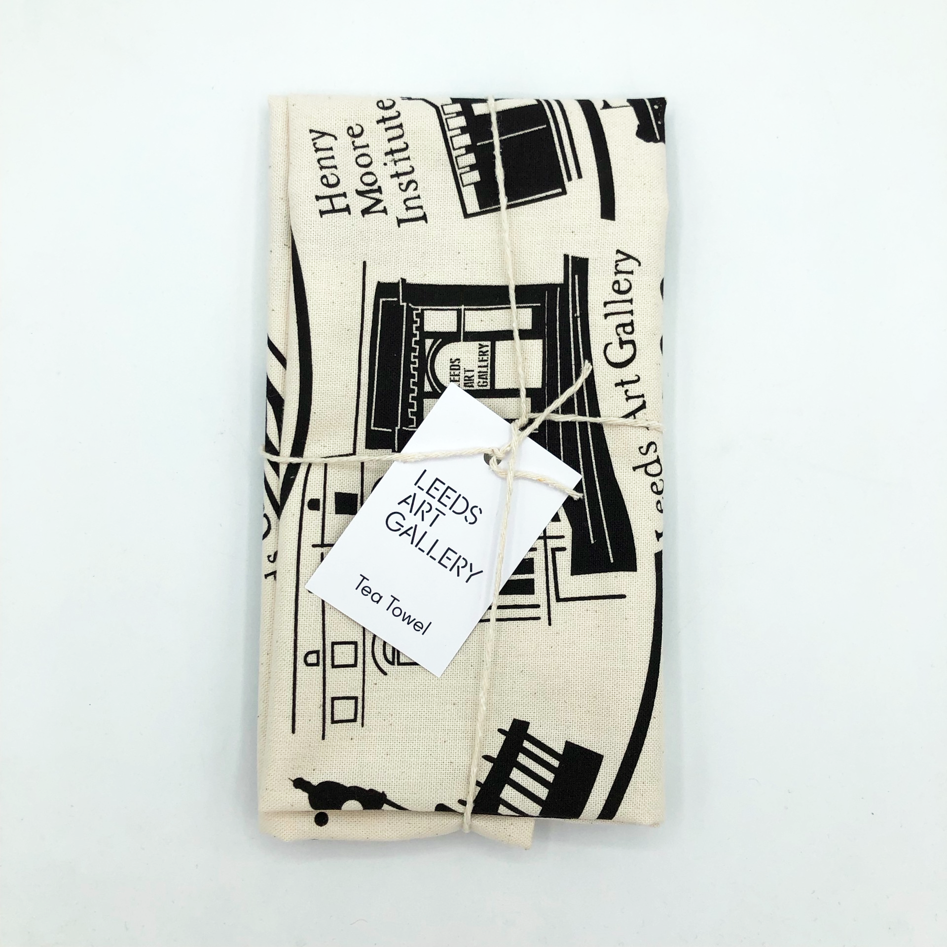 Tea towel with black graphics and 'Leeds Art Gallery' tag on a white background