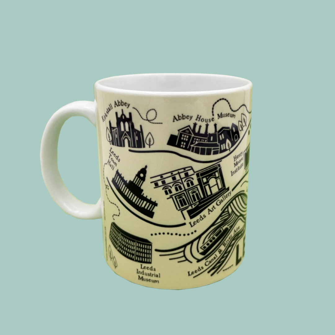 Mug with black illustrations of landmarks on a light blue background