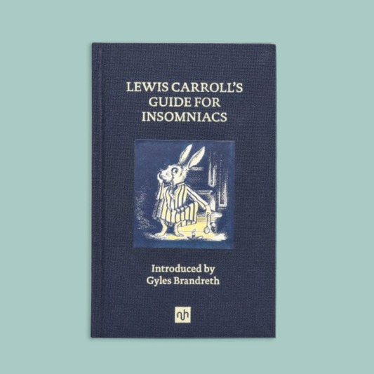 A blue book with an illustration of a rabbit and gold foiled text on the front.