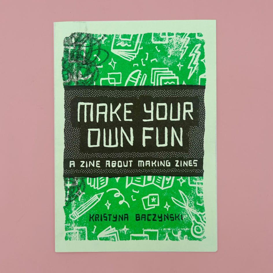 A book cover titled 'MAKE YOUR OWN FUN: A ZINE ABOUT MAKING ZINES' by Kristyna Baczynski, featuring a green and black graphic design on a dusty pink background.