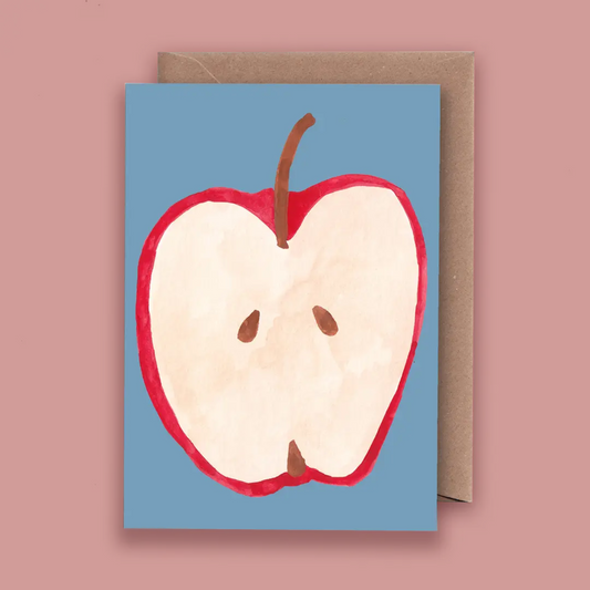 Card with a half-cut apple illustration on a blue background