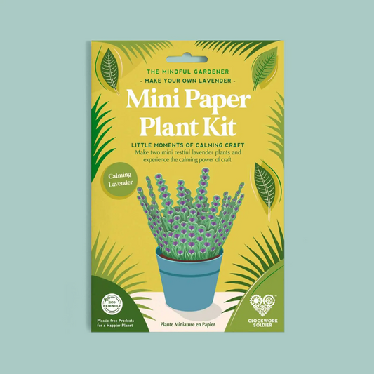 Packaging for the 'Mini Paper Plant Kit' by Clockwork Soldier, featuring a yellow and green design with a paper-cutout lavender plant in a blue pot, set against a solid light blue background.