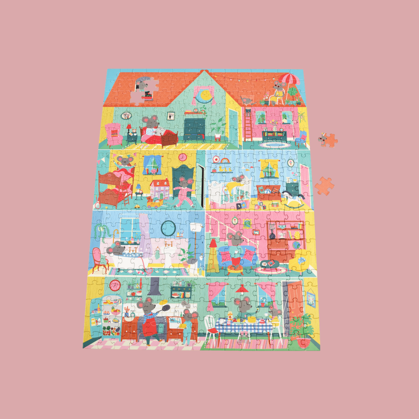 Children's puzzle with a colorful house design on a pink background