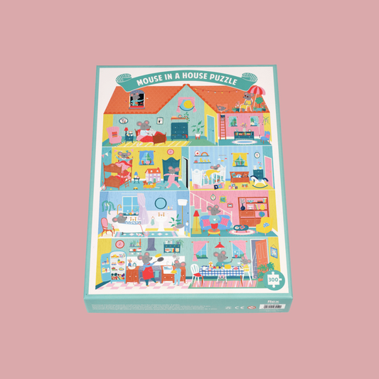 Puzzle box with a colorful illustration of a house and mouse on a pink background