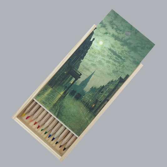 Set of colored pencils with a wooden box featuring a scenic design on a gray background