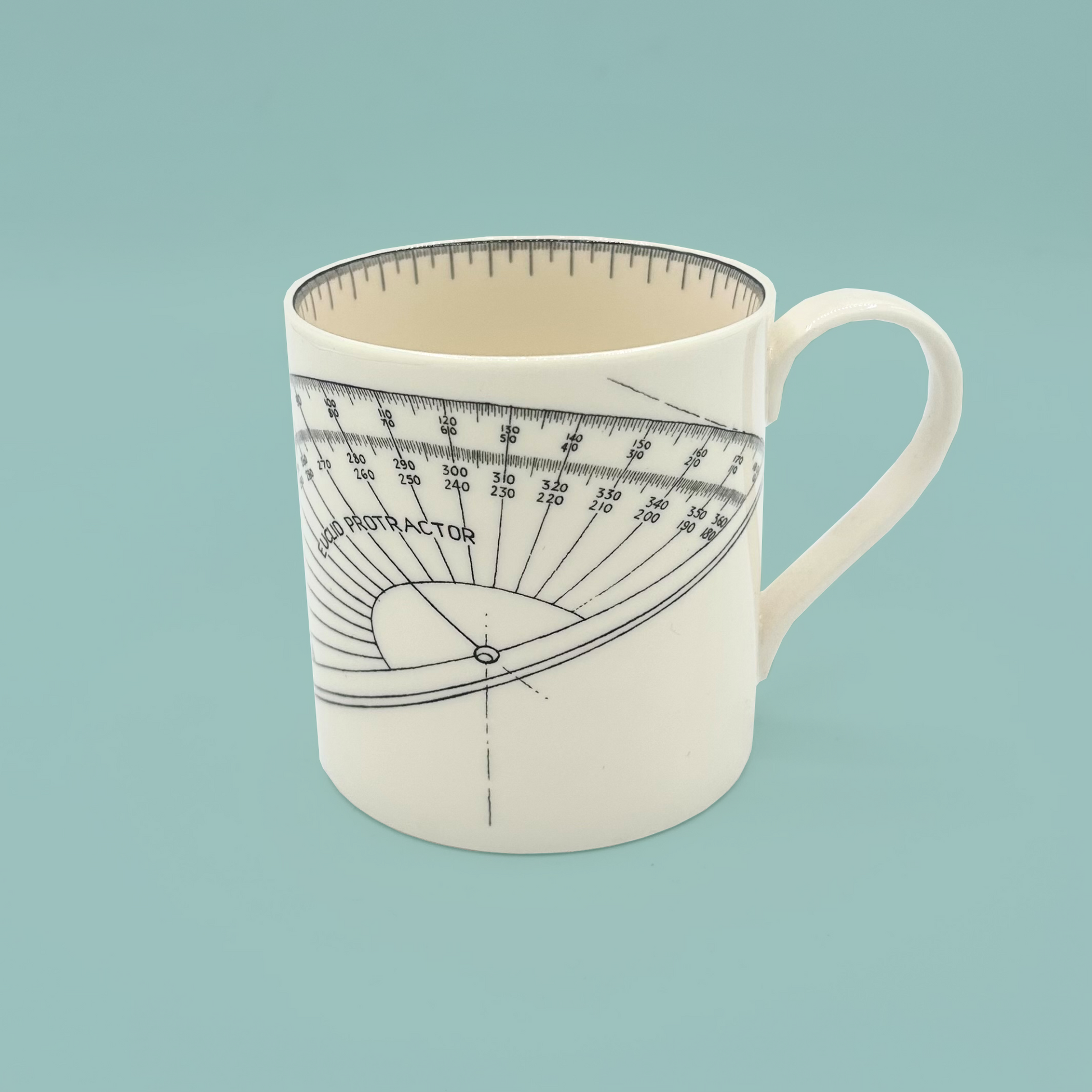 Mug with protractor design on a light blue background