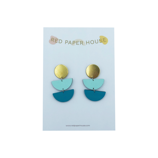 Pair of earrings on a Red Paper House branded card