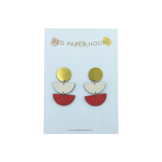 Colorful earrings on a Red Paper House branded card