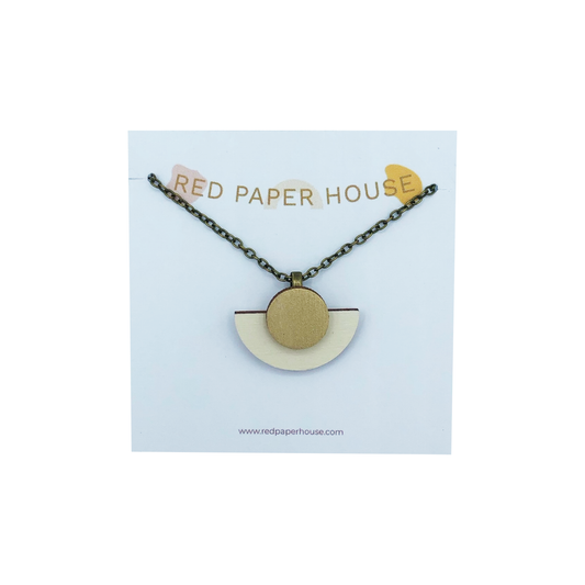 Necklace with geometric pendant on a Red Paper House card