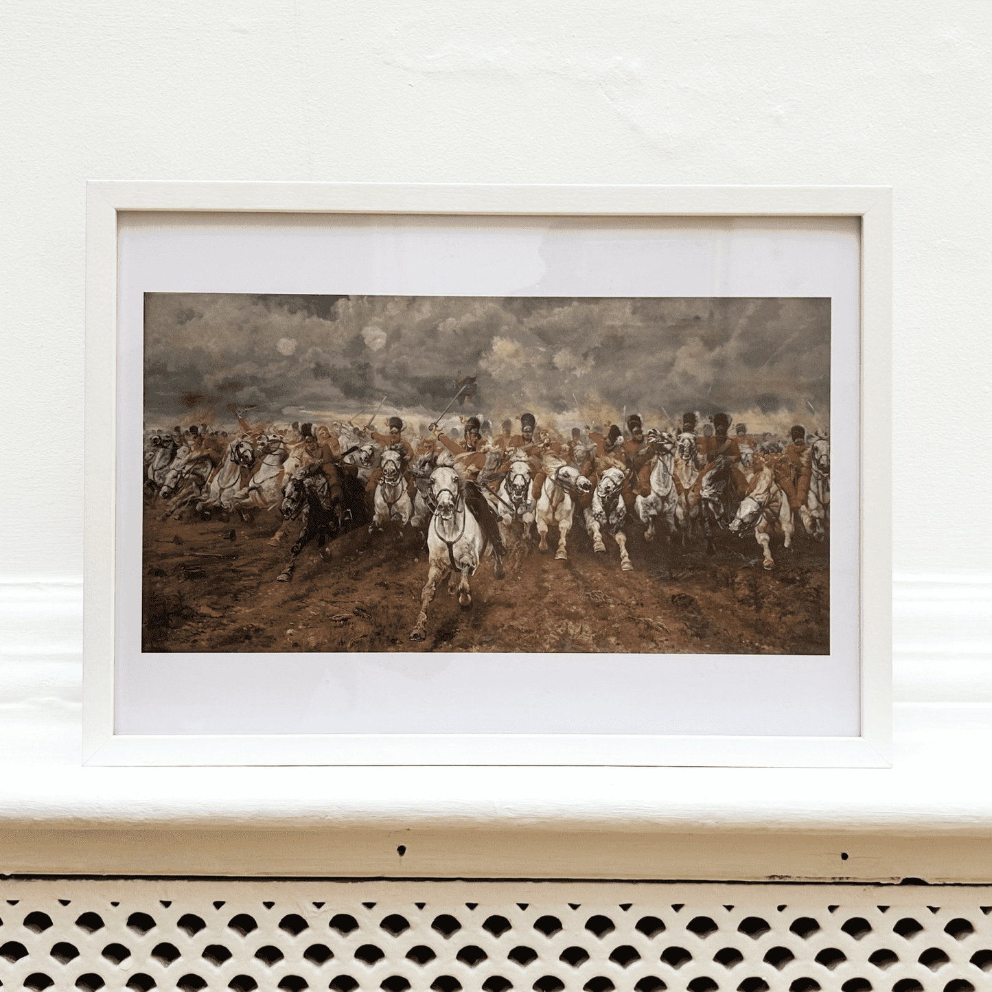 Framed print of a historical battle scene with soldiers on horseback.