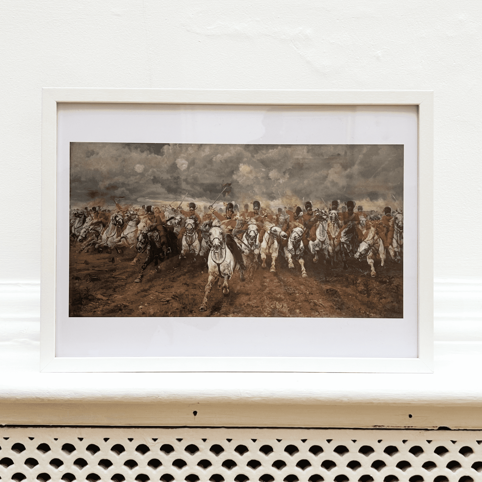 Framed print of a historical battle scene with soldiers on horseback.