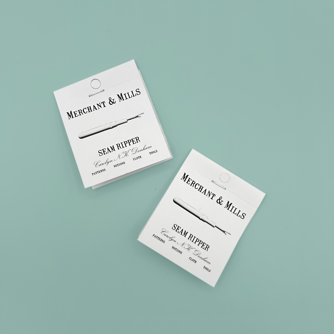 Two packages of Merchant & Mills seam ripper on a light blue background